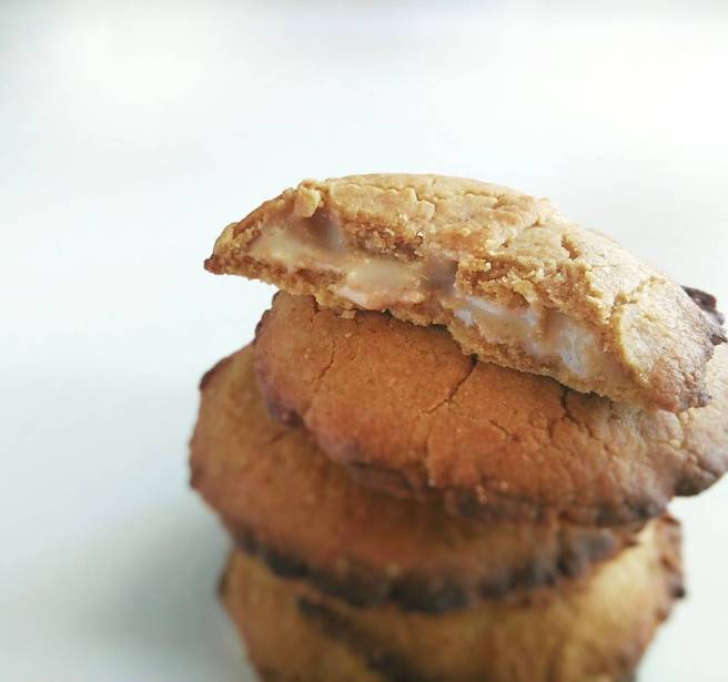 stacked peanut butter cookies with white chocolate filling